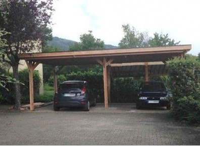 Double carport à partir d'une ossature en bois Douglas à toit plat
